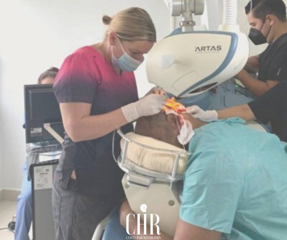 Doctors using the ARTAS robot for a hair transplant
