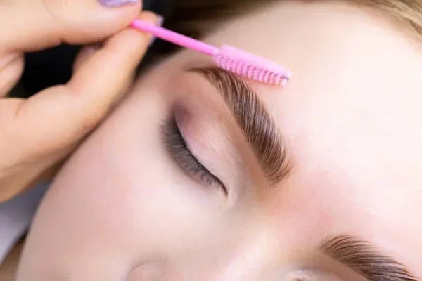 Portrait of a woman with perfectly styled eyebrows, demonstrating facial balance achieved after applying the benefits of eyebrow design techniques.